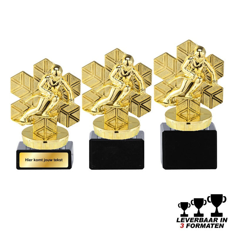 Goudkleurige ski trofee met skiër en sneeuwvlok, op zwarte marmeren voet – leverbaar in 3 formaten en personaliseerbaar.