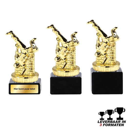 Streetdance trofee in goud met breakdance-pose en muurdesign op zwarte marmeren voet – leverbaar in 3 formaten en personaliseerbaar.